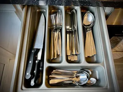 a tray of utensils in a drawer in a kitchen at 4 Bedroom House - DISC0UNTS - Parking, Contractors, Group, Family in Colchester