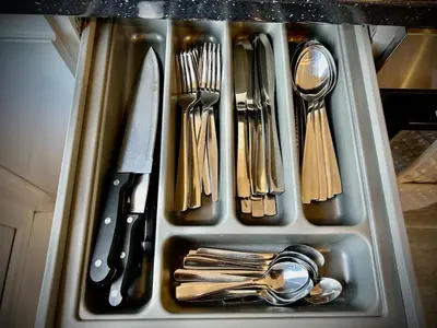 a tray filled with utensils in a drawer at 5 Bedroom House - DISC0UNTS - Parking, Contractors, Crew, Group, Family in Colchester