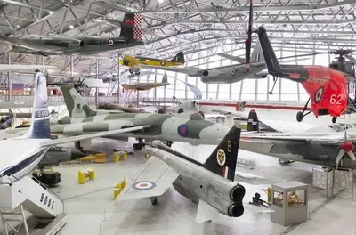 a museum with many planes on display in a hangar at Vineyard Style 2BR with Garden and Parking in Shudy Camps