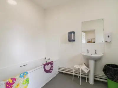 a bathroom with a sink and a mirror at Betsy Cow Shed 2 in Woodbridge