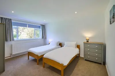 two twin beds in a room with a window at Host & Stay - Park View in Thetford