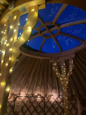 a ceiling of a gazebo with lights at The Skye Yurt in Messing