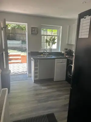 a kitchen with a sink and a dishwasher at Upto 9 Contractors, LongStay Discounts in Hythe