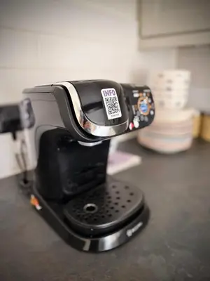 a coffee maker sitting on top of a counter at Churchgate Apartment in Bury Saint Edmunds