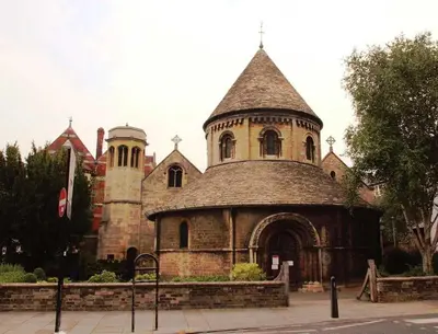 an old building with a tower and a church at Modern Central Apartment with Parking in Cambridge