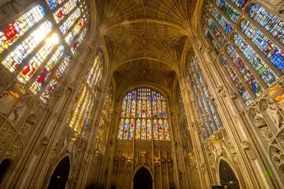 a large cathedral with many stained glass windows at Modern Central Apartment with Parking in Cambridge
