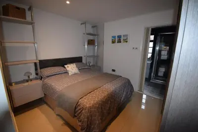 a bedroom with a bed in a room at Eco Deco in Frinton-on-Sea