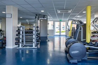 a gym with several treadmills and machines at For Students Only - The Maltings in Colchester in Colchester