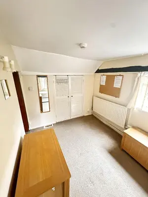 a room with white walls and a table and windows at Memorial University, Harlow Campus in Burnt Mill