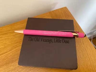 a pink pen sitting on top of a table at The Old Vicarage BandB