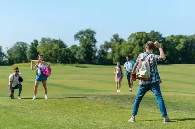 a group of people playing golf on a golf course at Lovely Caravan At Carlton Meres Holiday Park Ref 60034O in Saxmundham