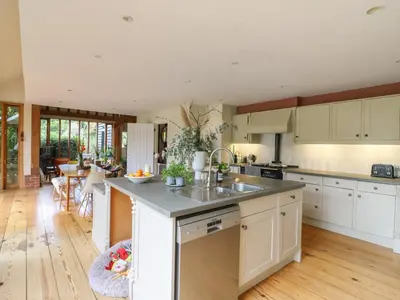 a kitchen with a sink and a counter top at Headland Barn in Maldon