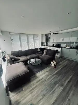 a living room with a couch and a table at One bed flat in Sunny Southend! in Southend