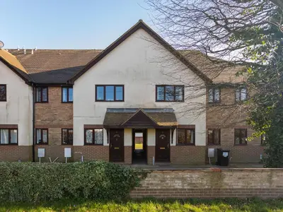 a large brick house with a front porch at K Suites - Tollgate Court in Colchester