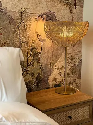 a lamp on a night stand next to a bed at Stunning and Peaceful 2 bed Flat 10 mins from Stansted Airport in Stansted Mountfitchet