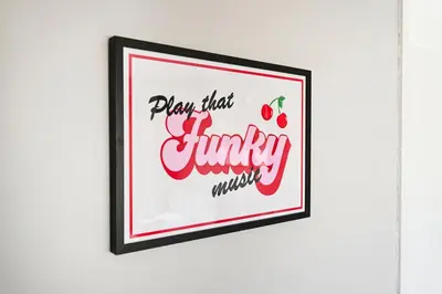 a picture of a sign that reads play that funky music at Modern 3-Bed Maisonette - Epping High Street - Parking - LMV Property in Epping