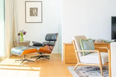 a living room with two chairs and a desk at Heath House 6 in Thorpeness