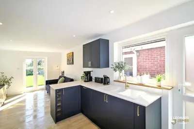 a kitchen with a sink and a counter top at Bright & Stylish Bungalow Retreat in Attleborough in Attleborough