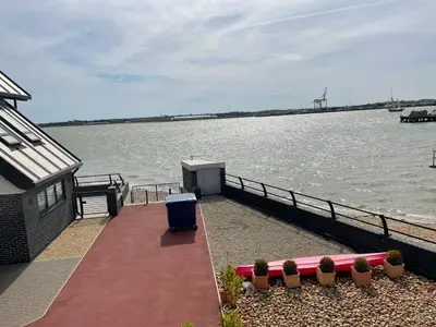 a house with a view of the water at Ten Admiralty Pier in Shotley Gate