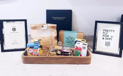 a wooden basket filled with food and other items at Little Dunton Lodges 2 in Brentwood