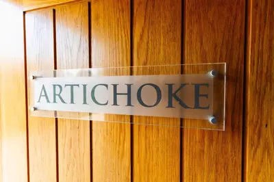 a sign that reads antichoice hanging on a wooden door at Chippenham Park Garden Rooms in Chippenham
