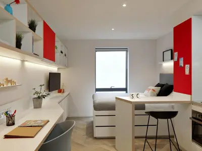 a small apartment with a desk and a bed in a room at For Students Only - Student Castle Cambridge in Cambridge