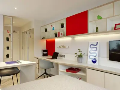 a room with a desk with a laptop on it at For Students Only - Student Castle Cambridge in Cambridge