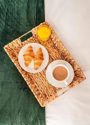 a tray with two plates of croissants and a cup of coffee at 4 Bed, 3 Bath Townhouse in Colchester - Business, Contractor and Leisure - Singles or Superkings - Disc0unts in Lexden