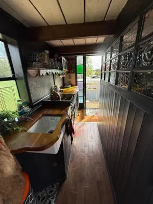 a kitchen with a sink and a counter top at Rum Bridge Glamping and Fishing Resort in Clare