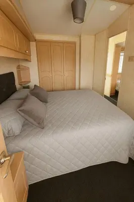 a bedroom with a large bed in a room at Rohannah A and C Ultimate Retreat in Colchester