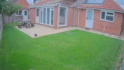 a backyard with a picnic table and a bench at Detached, 4 Double Rooms, 2 En-Suites, 5 Car Parking in Lexden