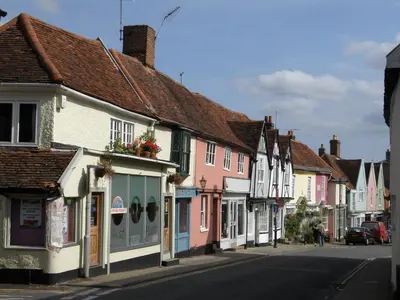 a row of houses on a city street at Gazebo Lodge in Martlesham