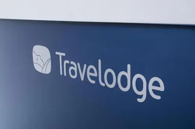 a sign with the words travel lookedage on it at Travelodge Cambridge Swavesey in Bar Hill
