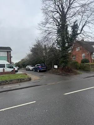 a street with cars parked on the side of the road at House in Colchester with parking in Colchester