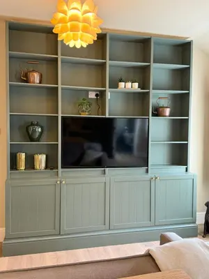 a large entertainment cabinet with a television in it at NEW Gorgeous Boutique Country Getaway in Tuddenham