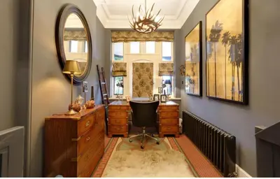 a home office with a desk and a chair at Herringswell Manor in Red Lodge