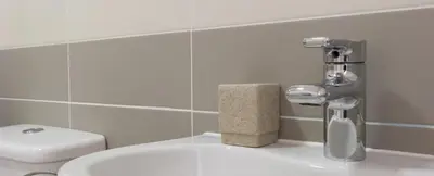 a bathroom with a white toilet and a sink at Citystay Living - Citygate in Cambridge