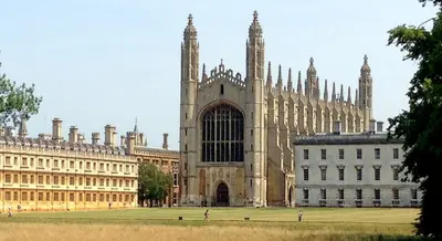 a large building next to a white building at The Holly Tree in Cambridge