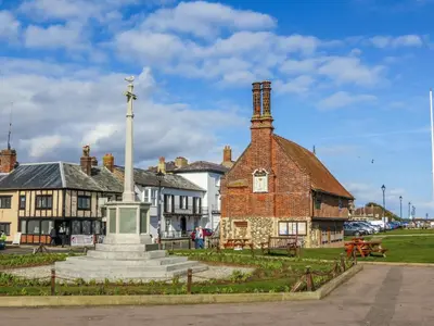 an old building with a cross on top of it at Walnut Cottage in Aldeburgh