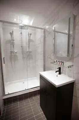 a bathroom with a shower and a sink at Best Western Brome Grange Hotel in Brome