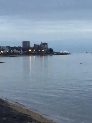 a large body of water with a city in the background at Southend Airport Bed & Breakfast in Rochford