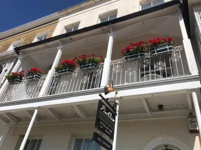 a building with flower boxes on the balconies at Pier View Self Catering Luxury Apartments in Southend-on-Sea