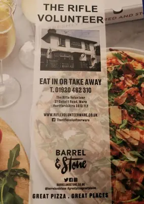 a poster for a pizza and a glass of wine at The Rifle Volunteer in Ware