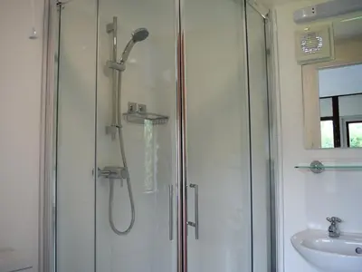 a bathroom with a shower and a sink at Italian Carriage-Ukc3492 in Wetheringsett