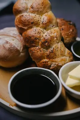 a pile of bagels sitting on top of a plate at The Bull Inn in Woolpit