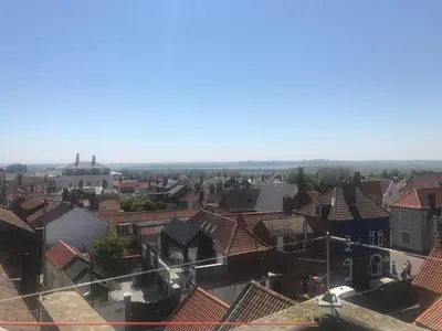 an aerial view of a town with roofs at Stoney Beach - Aldeburgh Coastal Cottages in Aldeburgh