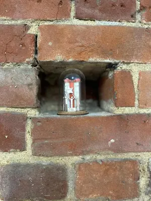 a small metal object in a brick wall at The Stables & Silos in Braintree