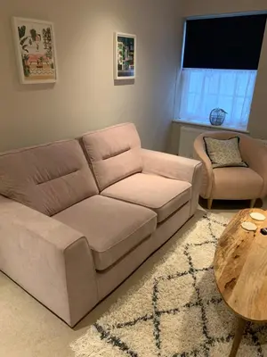 a living room with a couch and a coffee table at 10A Ruston Chambers Free parking, Luxury 2 bedroom city center apartment in St Ives