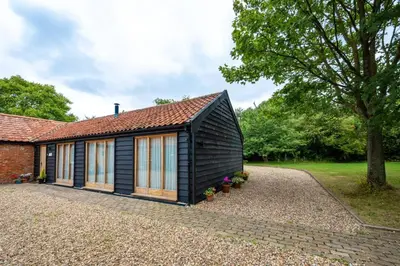 a small house with a black exterior at 1 Bed in Wilby oc-wlo in Wilby