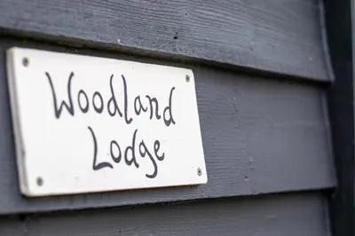 a sign on a wall with the words wood and advice at 1 Bed in Wilby oc-wlo in Wilby